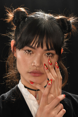 NEW YORK, NY - FEBRUARY 10:  A model poses backstage with nails by CND for Jeremy Scott Fall/Winter 2017 on February 10, 2017 in New York City.  (Photo by Jennifer Graylock/Getty Images for CND)
