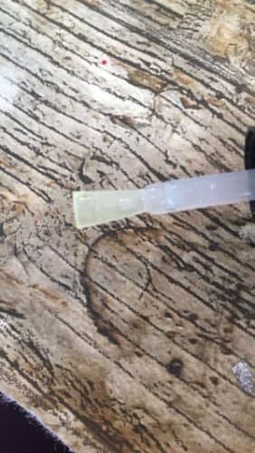 Brush exposed to UV light - product has cured and rendered the brush unusable