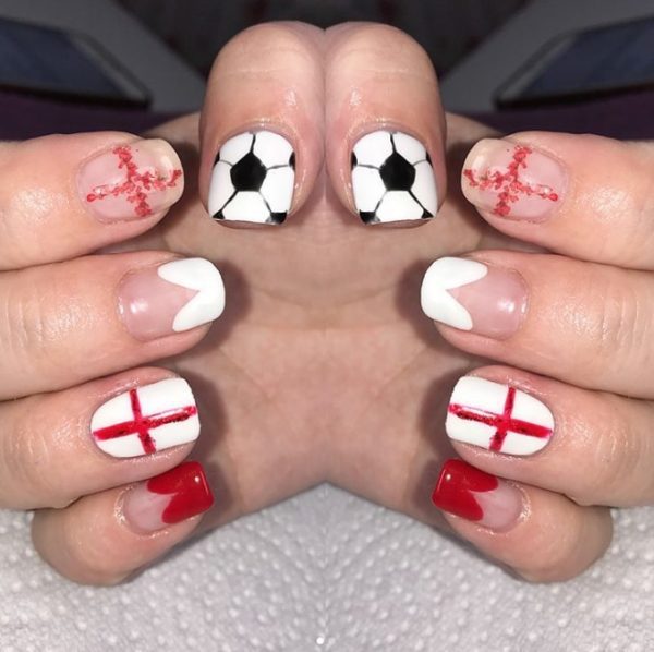 We love the football accent nails in this design by @daniellejade.beauty for an England fan
