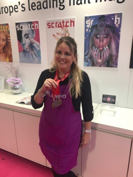 Michelle Brookes proudly reveals her three Nailympia London competition medals