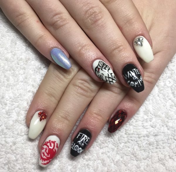 The emblems of the Stark and Targaryen Houses features across these nails