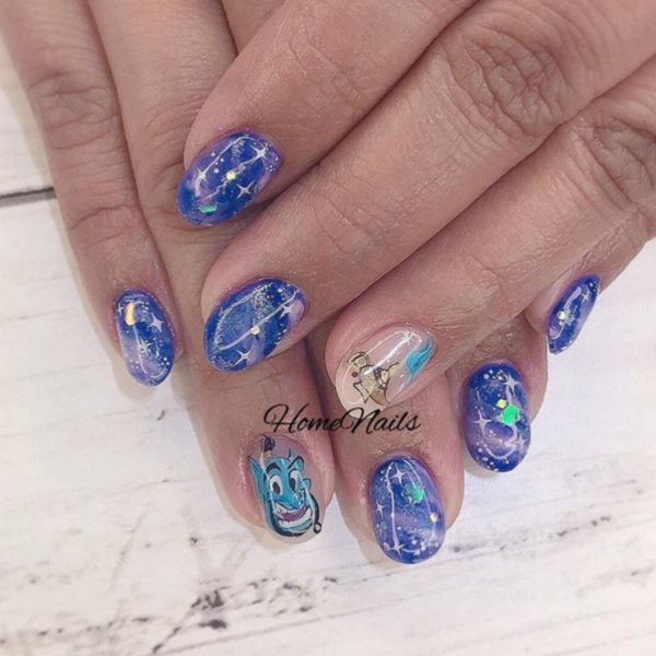 Swirls of smoke appear in this design featuring the Genie, by @homenails