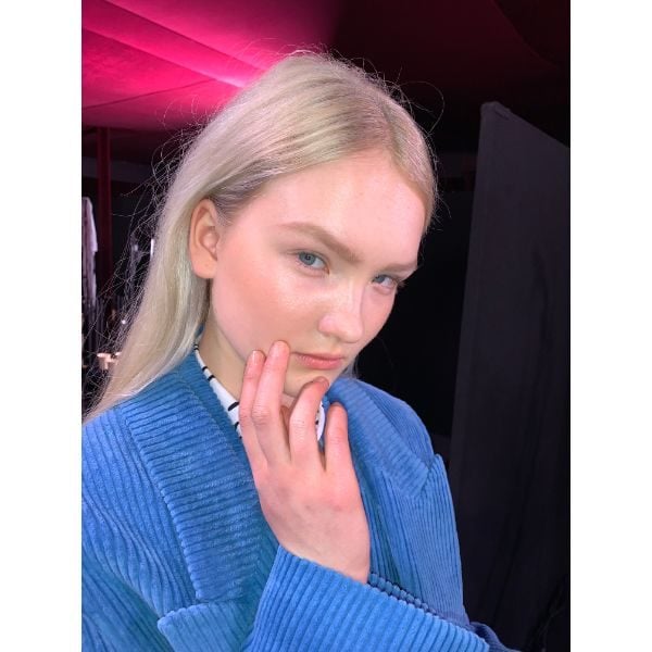 This model's nails look shiny and healthy