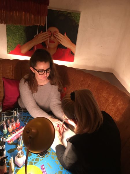 Zoe having her nails painted