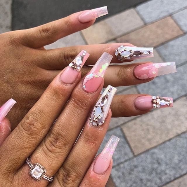 Eleanor Szejner's pink acrylic nails