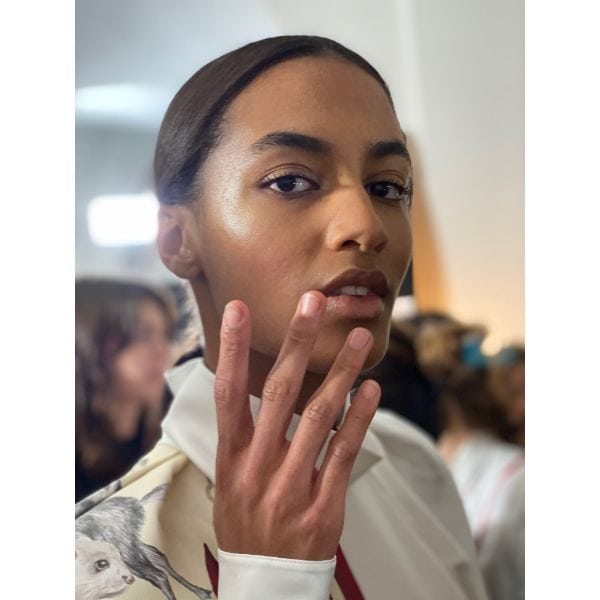 Another model displays her nude and natural nails