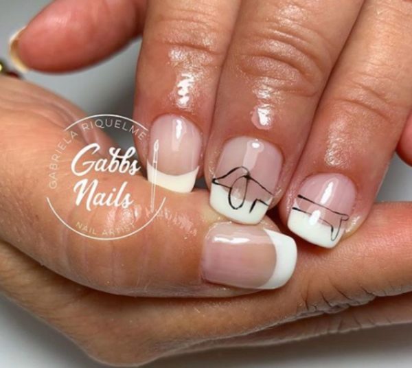 Gabriela Riquelme does the French manicure doggy style with a dainty dachshund outline
