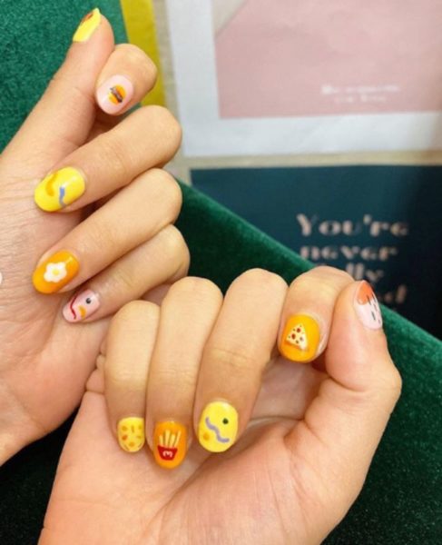This brightly coloured set by @piji.nailbar has us hungry for more