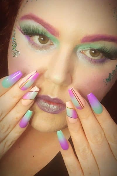 Kym Symington
"This photo represents myself, exploring my colourful side, focusing on crisp clean lines and contrasting blends! As a first time competitor, I'm hoping to invite the audience into my fun, mesmerising look!"