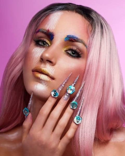 Simone Radley
"I think my entries represent me as they are totally different styles which is how I feel my work is, totally different and eclectic i’ll do one thing one day and something totally different the next and can never decide on one favourite style or technique I love it all. One image is girly, soft and pastel with a summer theme fitting the time of year while the other is more bold and edgy with a technological theme representing how life recently has turned more to technology than human interaction. So i would describe these imagines exactly as I would describe myself, different, eclectic and fun."