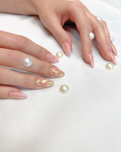 Grace Suggett
"My love for minimalism, white, gold and pearl/shell inspired these images. Having grown up in the small town of Saltburn by the Sea, it would be wrong for me not to feel a connection to the ocean and all that comes with it. Last year my love for all things beach took me to the small Greek islands of Ios and Santorini. Whilst there I completely fell in love with the hundreds of immaculate and minimalist white buildings, stunning beaches scattered with sea shells and unbelievable golden sunsets! The golden sunsets, stunning white buildings and sandy beaches of Greece and Saltburn by the Sea combined is what I hoped to capture in my images. This is why I chose a minimalist white background, added a touch of gold and pearl and incorporated a sea shell earring."