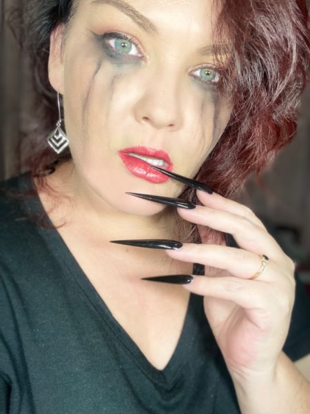 Amy Watts
"Throughout this difficult year and during Covid-19 lock down I have cried many tears. When we were told to shut down our business I thought my life was over so I spent most of my time of lock down doing my own nails and doing my makeup in hopes of lifting my spirits. When people ask me if I could only wear one colour - it would be black, they would be extremely long and they would of course be stilettos! This image represents me in my truest form."