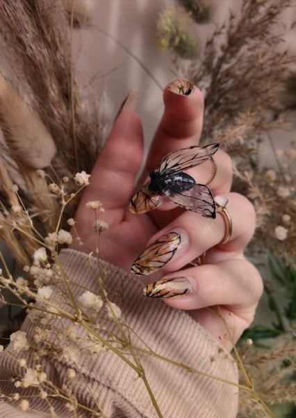 Jennifer Seales
"I wanted to create an image that showcases my love of nature, fusing the effortless beauty of Mother Nature into a contemporary style which encapsulates my ethos when it comes to designing nail art. The idea was for an overall image to represent mourning the end of summer, with the fly historically used in artwork to symbolise decay and melancholia."
