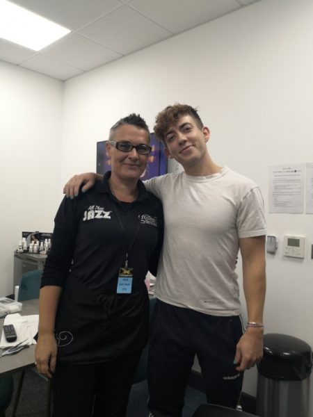 Claire working behind the scenes at The X Factor with singer, Kevin McHale
