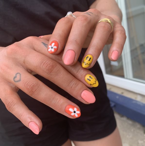 nataszija moore matte smiley nails