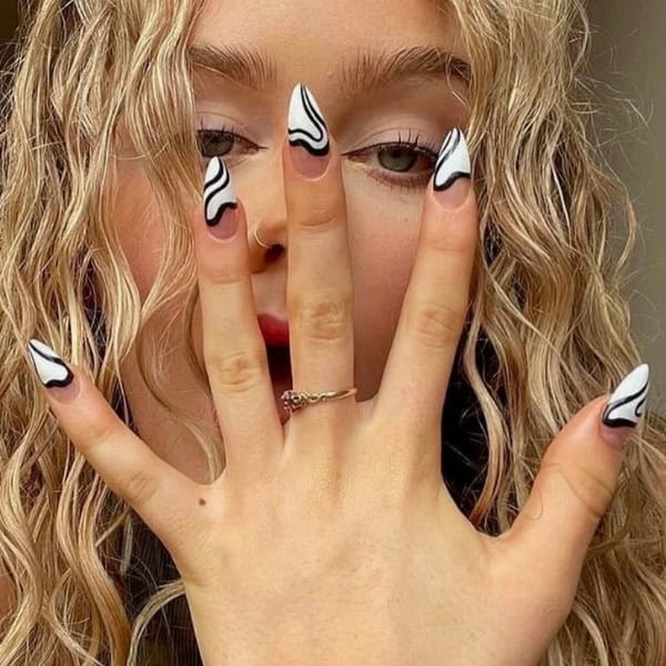 lucy greenman black and white swirl nails