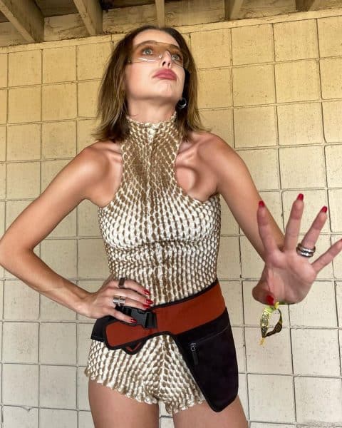 YouTuber, Emma Chamberlain, donned a chic and glossy apple red nail shade. @emmachamberlain