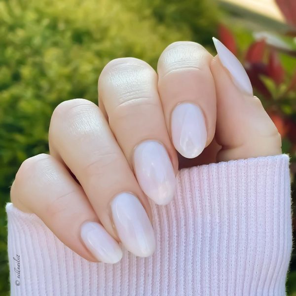 @nellnailsit uses the Queen’s go-to nail polish, Essie’s Ballet Slippers