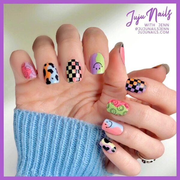 @jinjunailsjen complements this checkerboard style with a multicolour mix and match design. 