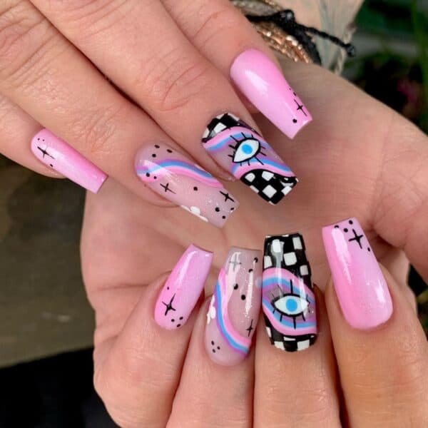 @nailsbykristie uses colour and eye-catching designs to make this checkerboard design pop. 