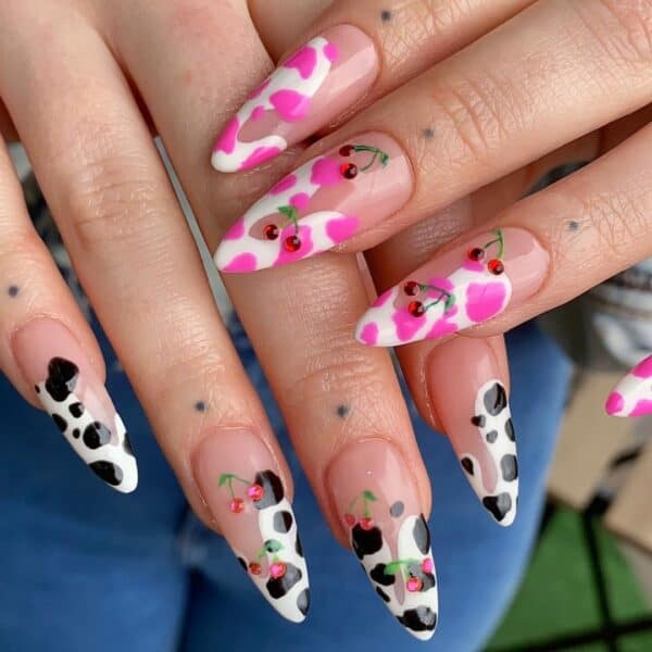 @abbinail adds crystal cherries to this cow print nail look. 