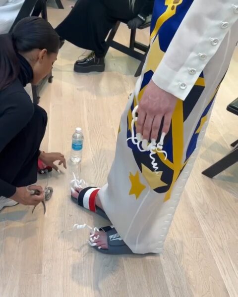 Extreme, curly nail shapes on both fingers and toes at the Thom Browne show, courtesy of Juan Alvear. Image: @stephsaltzman