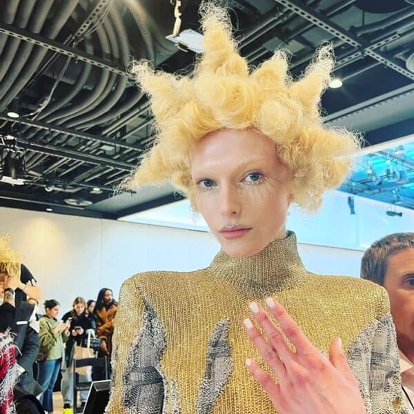 Juan Alvear's extreme styles at the Thom Browne show were paired with classic, white nails by team Priti NYC. Image: @pritinyc