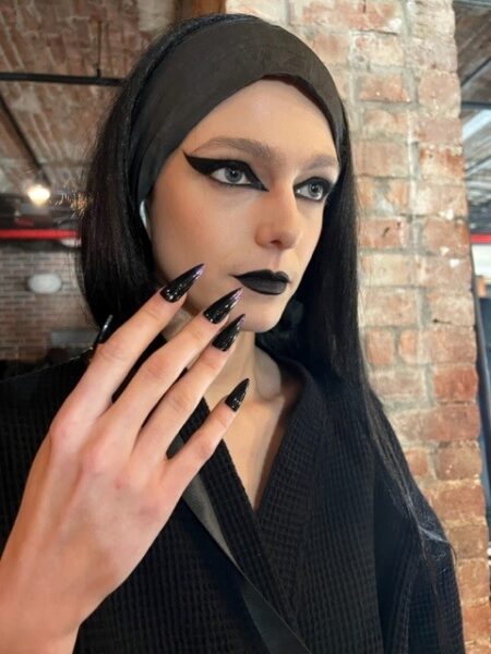 At the Rodarte show, lead nail stylist for Morgan Taylor, Danielle Candido, said: “The black grounds all of the majestic colours, bringing haute couture to a different level. It takes gothic and makes it royal. The shape of the nail reflects the plunging neck lines, angular designs and graphic eyeliner in linear shapes.”