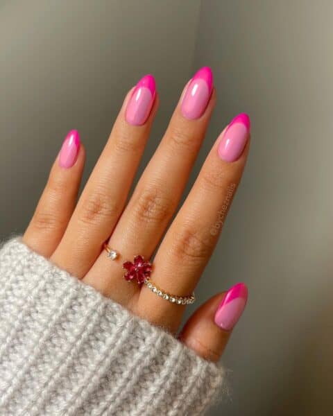 Emily Zheng of @bycheznails pairs a pearly pink chrome base with a magenta French tip.