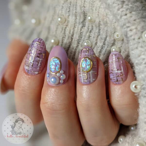 Adelina Walker - "Chanel tweed jacket-inspired nails."