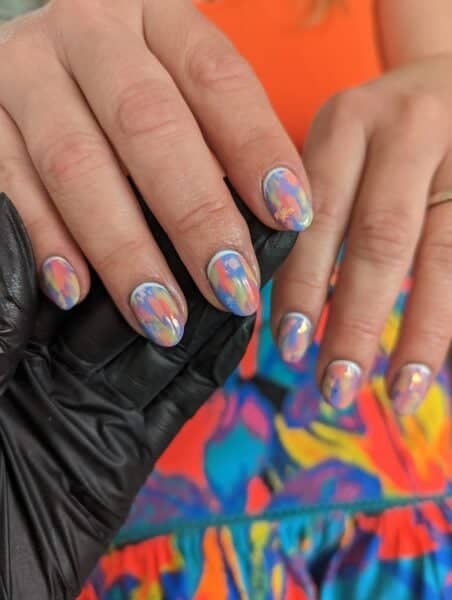 These nails by Laura-Anne Beare match her client's skirt.