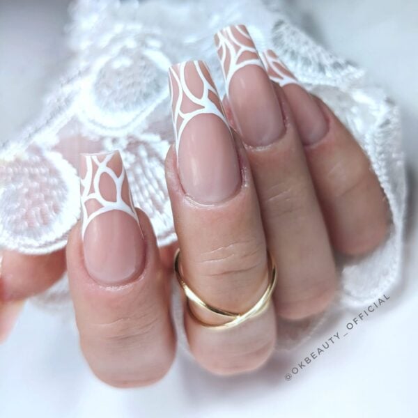 Oksana Danovska's lace-inspired nails.