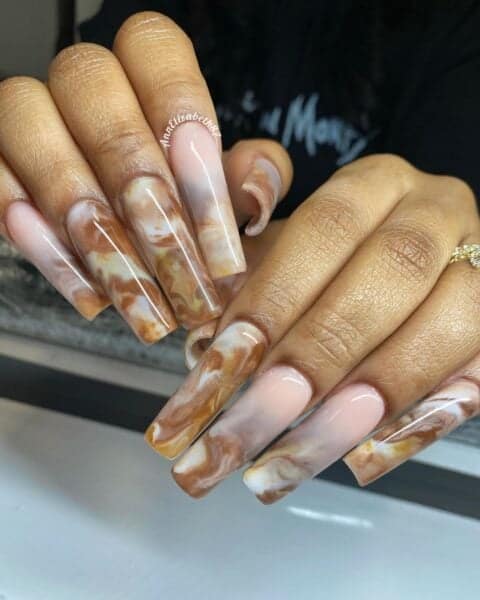 Keep your nail looks as strong as your coffee, like US-based @annelizabeth87, who created these marble enhancements.
