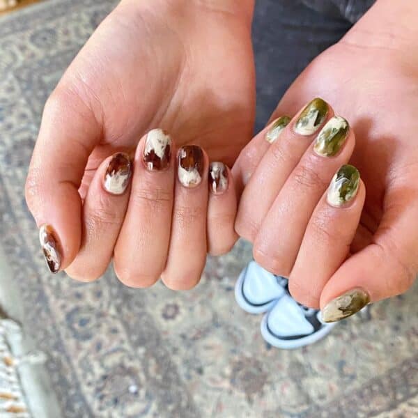Mix and match with the trending latte and matcha nail looks, like Tzu-Meng Pan of @naughty_nail_bar.