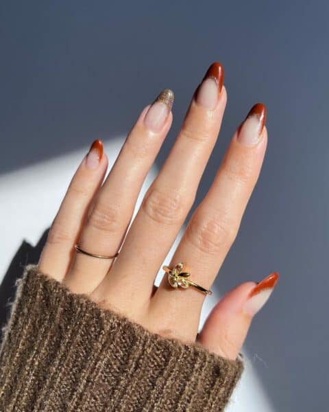 Cara of @polishedprettythings adds sparkle to her latte twist on the French manicure.
