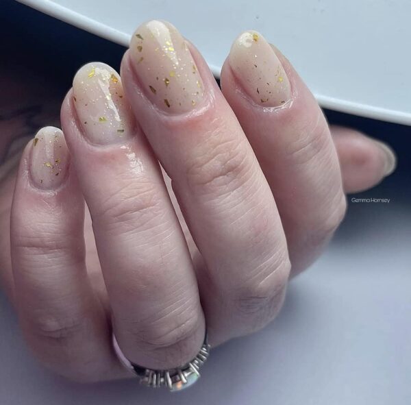 Gemma Tyrrell - "Very plain nails with subtle shimmer."