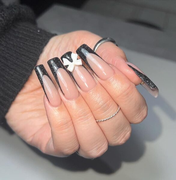 NudeyNails - "My 2024 nail trend prediction is bows."