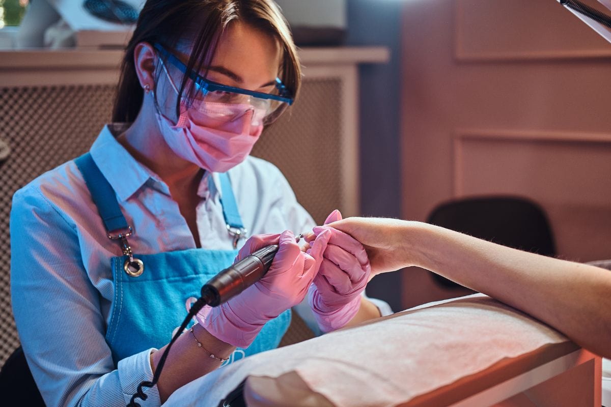 Nail Technician With E File Nail Desk