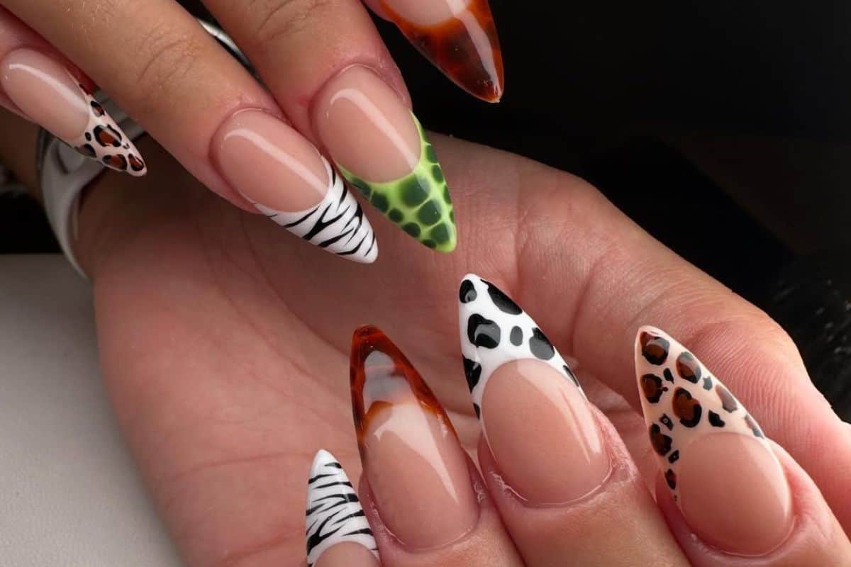 Animal print french tips by @karenmbrownnailartist