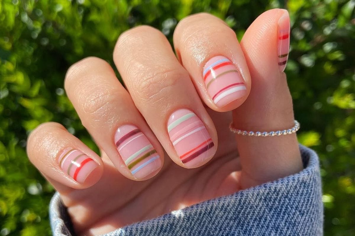 Striped nail trend lead image courtesy of Instagram.com/_by_shelley